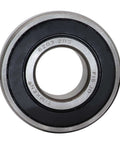 Close-up of a metallic bearing with visible model number 6203-2RS, suitable for machinery and industrial applications.