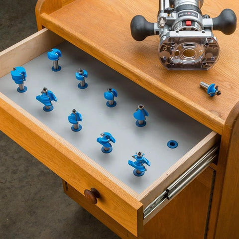 Router Bit Storage Inserts Set For 1/4 And 1/2 Inch Shank Router Bits in wooden drawer, durable molded polyethylene organizer.