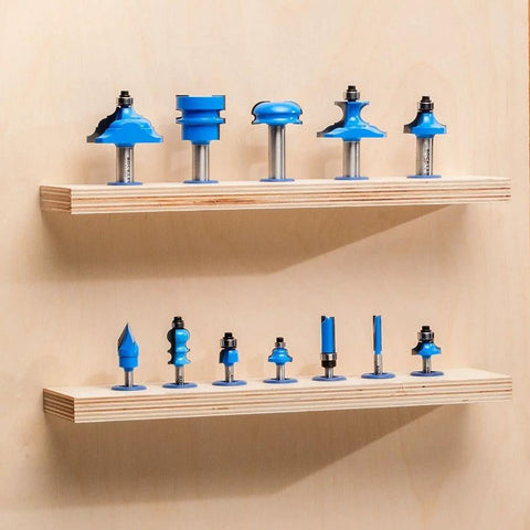 Router Bit Storage Inserts Set For 1/4 And 1/2 Inch Shank Router Bits displayed on wooden shelves