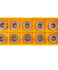 SRDPN1616H12 Tool Holder With 10 RPMT1204 MOE Indexable Milling Inserts set in yellow case for CNC milling.