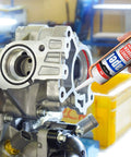 Applying Heavy Duty High Temp RTV Silicone Gasket Maker And Sealant For Auto And Machinery That Handles Serious Heat From 104 Degrees Fahrenheit To 572 Degrees Fahrenheit Red 10.2 Oz Gasket Sealing Adhesive For Engines And Exhaust to engine block