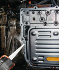 High Temp RTV Silicone Gasket Maker And Sealant 10.5 Fl Oz Red Heat Resistant applied to vehicle engine component
