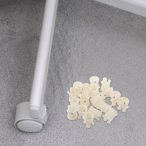Plastic Caster Socket Sleeves Set Of 20 Universal Wheel Socket Inserts for furniture feet next to chair leg on carpet