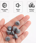 Hand holding 100 Pack Rubber Door Silencers For Metal Doors Half Inch Diameter Anti Collision Silencer Hinge Outlet Stop Noise Reducer