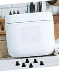 20 Pack Rubber Feet Replacement For Rice Cookers And Pressure Cookers Non Slip Bumpers next to a white cooker