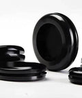 Close-up of black rubber grommets from 188 Piece Rubber Grommet Kit For Wiring Electrical Plumbing Round Hole Seals Waterproof Insulation And Wire Protection.