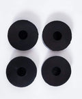 Four Pack Rubber Isolation Feet Pads For Vibration Damping, 1.5 Inch Outer Diameter, 0.5 Inch Inner Diameter, 0.4 Inch Thick displayed in a set of four