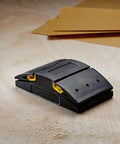 Rubber Sanding Block 5.1 Inch for wet or dry sanding fits quarter sheet shown on wooden surface with sandpaper sheets nearby