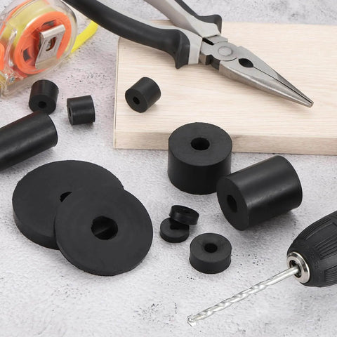 18 Pack Thick Rubber Spacers With 1 Inch Outer Diameter One Quarter Inch Inner Diameter And One Quarter Inch Thick Round Rubber Bushings displayed with tools