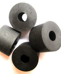 Premium 4-Pack Rubber Spacers For Anti-Vibration And Mounting, IZZY USA LLC, 3/4 In Outside Diameter By 1/4 In Inside Diameter By 1/2 In Thick, Made In USA, Multi-Purpose Use, ISO 9001 Quality. Four black rubber spacers arranged on white background highlighting dimensions and mounting use.