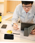 Rubber Vibration Isolation Pad For Washing Machines And Generators Heavy Duty Anti Vibration Pad on desk with tools and blueprints