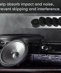 Eight piece set of thick rubber vibration isolation pads delivers solid damping for washers and appliances shown with audio equipment.