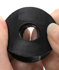 Close-up of a durable rubber washer being held, showing size 1.5 in OD, 0.5 in ID. Used for vibration damping and quiet operation.
