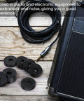 Durable rubber washers set delivers reliable vibration damping and quiet operation for machines, shown beside audio gear.