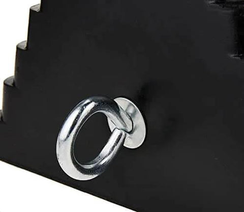 Close-up of Solid Rubber Wheel Chock With Eyebolt For Rigs, Trucks, Trailers, RVs And Small Aircraft, Heavy Duty Tire Restraint