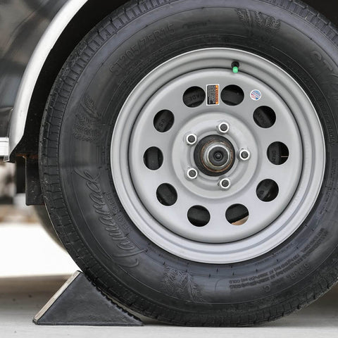Beefy Rubber Wheel Chock For Cars Trailers RVs And Utility Vehicles With Reinforced Grip Weather And Chemical Resistant 5x6x5 Inch Tire Stopper For Secure Parking And Service Bays Buyers Products WC1467A securing vehicle tire.