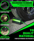 Heavy Duty Rubber Wheel Chocks for Trucks Trailers RVs and Aircraft with Non Slip Grip and Reflective Strips for Low Light Safety Rhino USA for All Weather Use shown in use on a vehicle tire