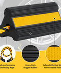 Heavy Duty Rubber Wheel Chocks Set With 52 Inch Nylon Rope Non Slip Tire Stop Blocks For RVs Campers Travel Trailers Motorhomes Aircraft Cars And Trucks 2 Pack High Visibility next to car wheel showing reflective yellow stripes.