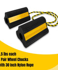 Durable Rubber Wheel Chocks For RV Trailer Camper Truck Car And Aircraft With Rope Two Pair Or Four Pack Three Reflective Strips Tough As Nails Heavy Duty Wheel Immobilizers By HOXWELL, black rubber with yellow reflective strips and rope.