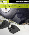 Built Tough Heavy Duty Rubber Wheel Chocks 2 Pack With Carrying Handle For RVs and Trailers shown in use under truck tire