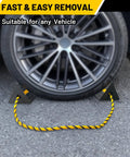 Versatile Rubber Wheel Chocks With Three Yellow Reflective Strips For RVs, Trailers, Cars on a tire, showing heavy duty placement