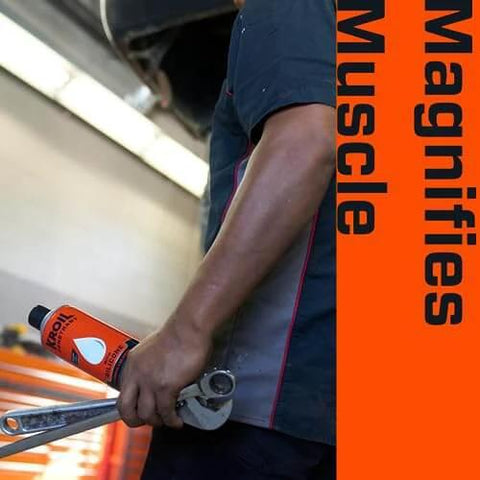 Person holding Rust Penetrating Lubricant Corrosion Inhibitor Oil 8 oz in workshop setting with tools in hand