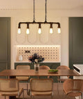 Rustic Industrial Tube Pipe Chandelier With Five Light Edison Style Steampunk Pendant Light Fixture installed in dining room