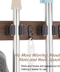 Rustic Wood Wall Mount Mop And Broom Organizer With 4 Slots And 4 Hooks, holding cleaning tools. Ideal for closet, garage, or kitchen use.