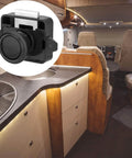 Image of 5 Piece Push Button Latch Cabinet Door Catch Keyless Cupboard Locks For RV Motorhome Camper Caravan Black Durable Zinc Alloy And ABS Construction Easy To Install Keeps Doors Secure While On The Move, shown installed in an RV kitchen.