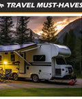 RV parked at campsite with awning extended, surrounded by mountains and trees at sunset, featuring outdoor chairs and lighting.