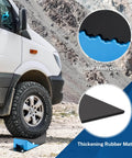 RV tire on Rugged RV Leveling Blocks For Travel Trailers Up To 35000 Lbs Curved Levelers 2 Pack With Blue Chocks.