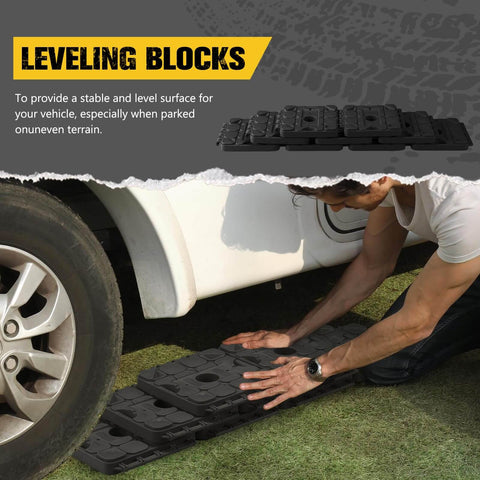 Man installing 3 In 1 RV Leveling Blocks Set For Camper And Trailer Stackable Jack Blocks Interlocking Recovery Boards And Wheel Stabilizers 10 Pack With Carry Bag Black