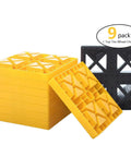 Interlocking Camper Leveling Blocks Kit With Anti Slip Ramps 10 Pack Includes One Wheel Chock And Handy Carrying Bag For Travel Trailer And RV No Slip Rock Solid Stabilization On Uneven Ground, showing yellow leveling blocks and black wheel chock.