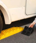 Setting up interlocking camper leveling blocks kit with anti slip ramps 10 pack includes one wheel chock for RV stabilization