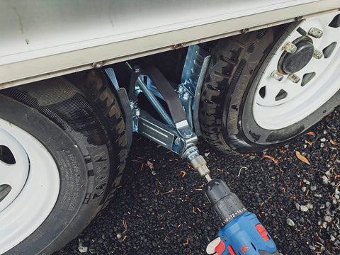 Camper Wheel Chock Heavy Duty Rotatable X Shaped Stabilizer For RV Trailer Drill Adjusted Two Sets Tire Lock Chocks installed