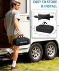 Man holding a bag with Heavy Duty RV Wheel Chocks Stabilizers With X Shaped Design For Travel Trailers And Campers 2 Pack Fits 3.5 To 12 Inch Wheel Gaps Safety And Stability Paulinn