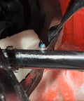 Close-up of installed grease fitting from 80 Piece SAE Grease Fittings Set With Common 1/8 NPT And 1/4-28 Threads in icy environment.
