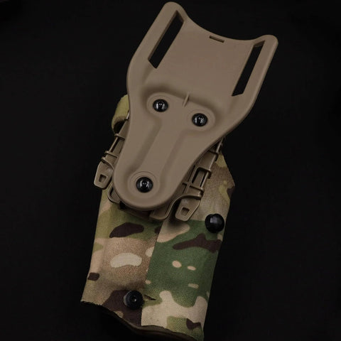 Holster setup with 12 Sets Black Gun Holster Screws and Anti-Slip 3 Prong T Nuts Kit for Safariland QLS System in camouflage pattern.