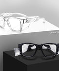 Safety Glasses With Anti Fog Lenses And Shields ANSI Z87 1 UV Protection, clear and black styles displayed on pedestals