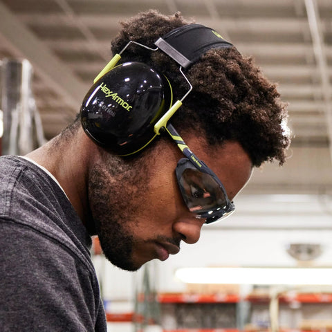 Worker wearing Safety Glasses With Removable Foam Gasket TruShield Anti Fog Adjustable Fit in industrial setting