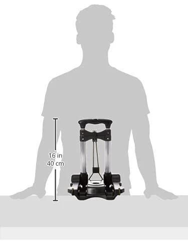 Silhouette of person holding Samsonite Compact Folding Luggage Cart, Black, One Size, showing 16-inch height with handle.