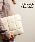 Person holding Nylon Puffy Zipping Laptop Sleeve 9.75 By 13 Inches Fits Most Screens Up To 14 Inches With Plush Lining, Sand Beige