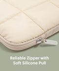 Close-up of sand beige Nylon Puffy Zipping Laptop Sleeve with plush lining and reliable zipper, fits 14-inch screens.