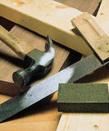 Sanding Block 3 Pack With Fine Medium Coarse Grits Shaping And Rust Removal tools and blocks on wooden surface
