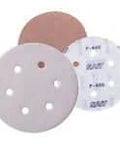 Three round sandpaper discs with varying grit levels, featuring multiple holes for dust extraction, placed side by side.