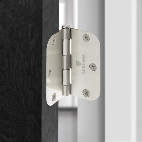 Installed 12 Pack Heavy-Duty 3-1/2" Interior Door Hinges with 5/8" Radius Corners - Satin Nickel on black door frame