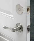 Steel Door Hole Cover Plate Satin Nickel Heavy Duty Fits Doors Up To One And Three Quarter Inches Thick Covers Unused Bore Holes For Privacy And Security Single Pack Ideal For Exterior And Interior Doors installed on white door