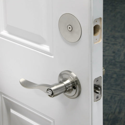 Steel Door Hole Cover Plate Satin Nickel Heavy Duty Fits Doors Up To One And Three Quarter Inches Thick Covers Unused Bore Holes For Privacy And Security Single Pack Ideal For Exterior And Interior Doors installed on white door