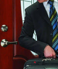 Satin Nickel Push Pull Rotate Door Lock Single Cylinder Deadbolt with Anti Pry Shield on a wooden door, showing easy operation