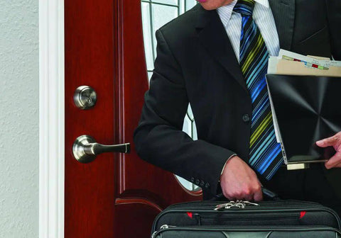 Satin Nickel Push Pull Rotate Door Lock Single Cylinder Deadbolt with Anti Pry Shield on a wooden door, showing easy operation